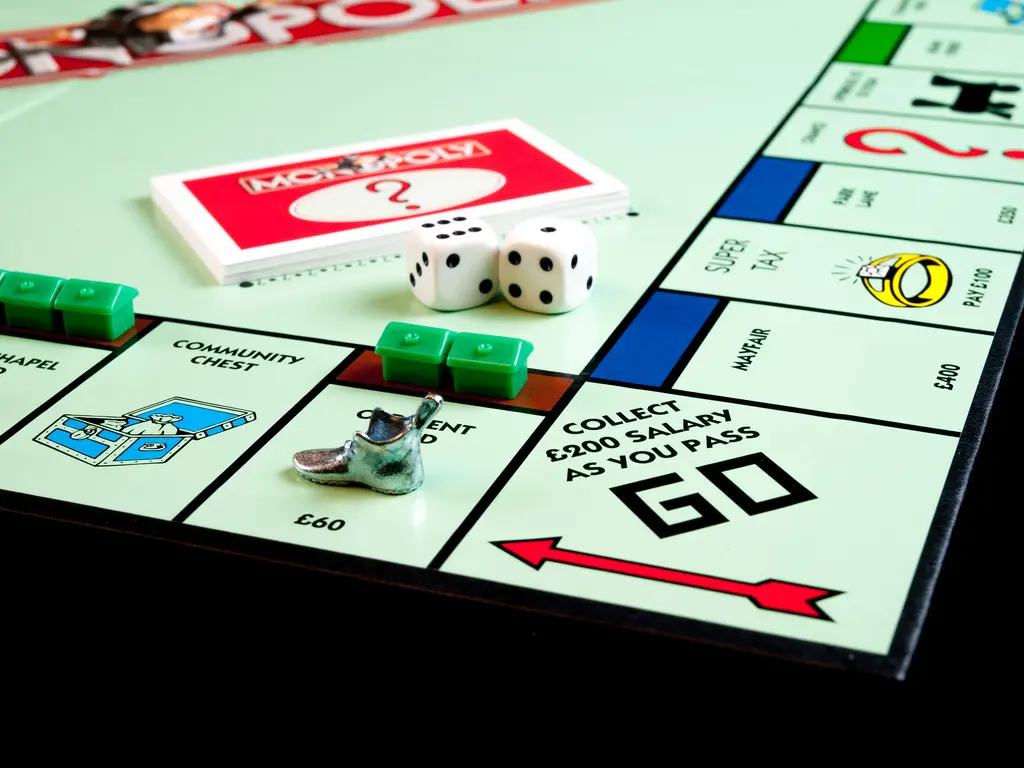 Play against friends or your iPhone with Monopoly app - NewsReports