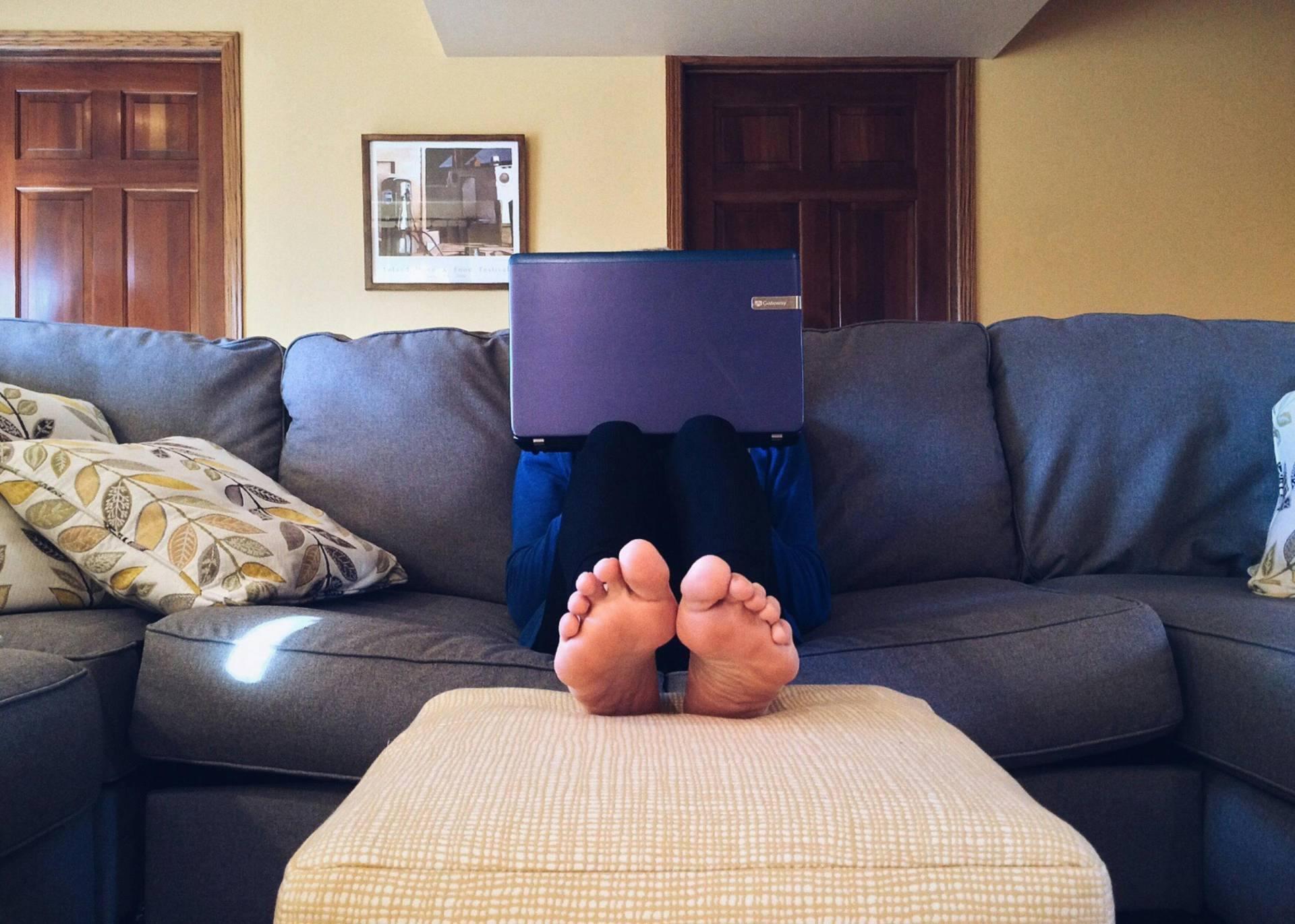 person on couch creating work life balance